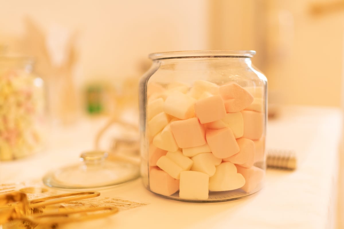 Hire candy cart — delicious pink and white marshmallows in glass jar for parties and events in Johannesburg, Sandton and Randburg