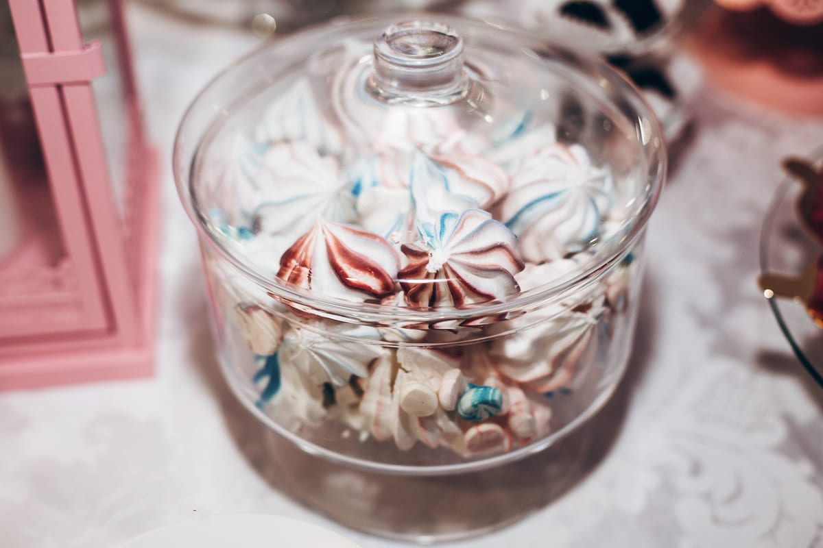 Hire candy cart — jar of colorful striped meringues on display for parties and events in Johannesburg, Sandton and Randburg