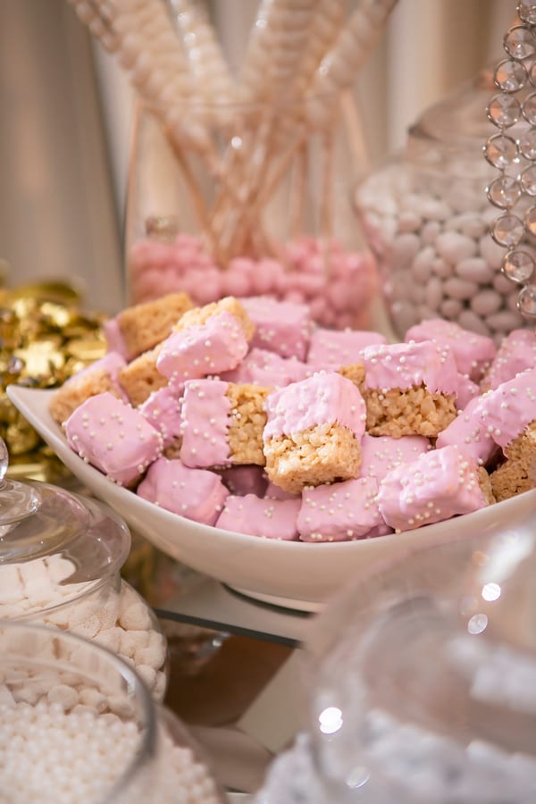 Hire candy cart — pink frosted treats on a glass dessert table for parties and events in Johannesburg, Sandton and Randburg
