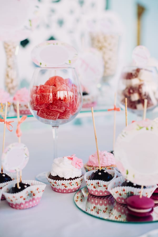Hire candy cart — colorful candy and cupcakes on a display table for parties and events in Johannesburg, Sandton and Randburg