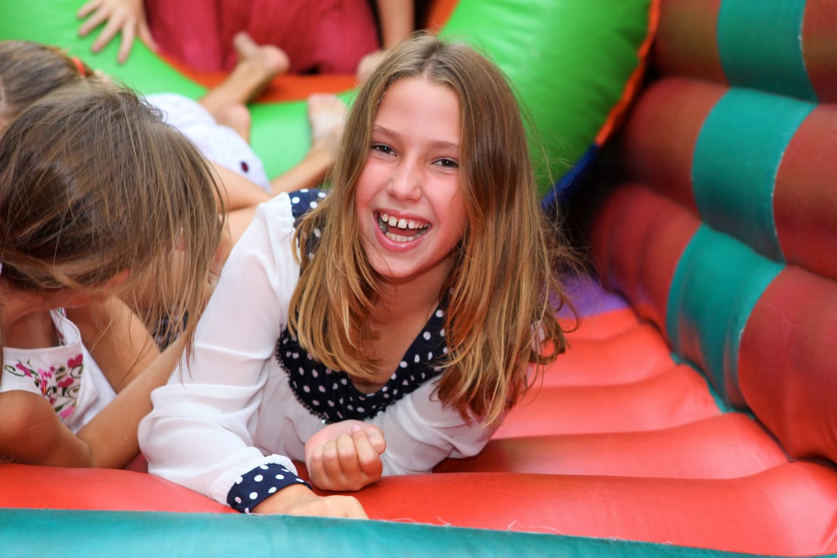Hire jumping castle — children playfully jumping on colorful bouncy cast for parties and events in Johannesburg, Sandton and Randburg