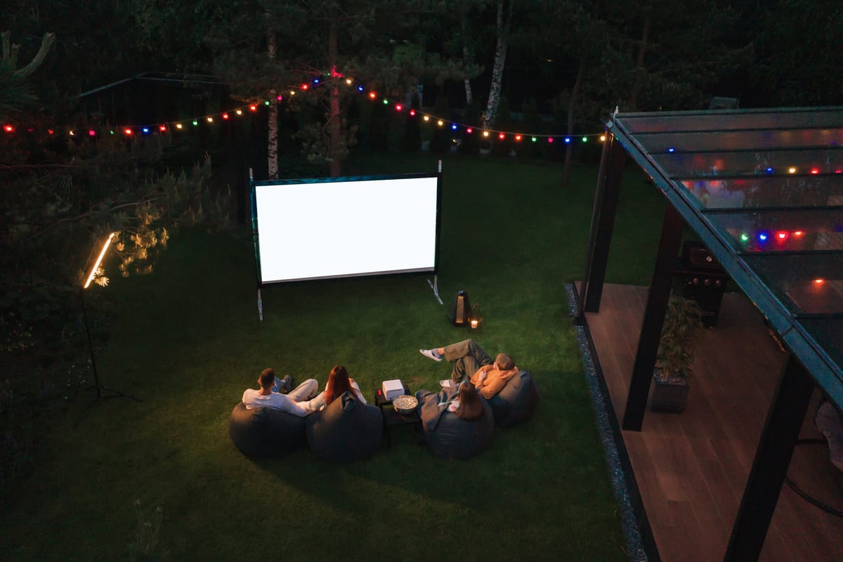Hire outdoor cinema — friends enjoying an outdoor movie night for parties and events in Johannesburg, Sandton and Randburg