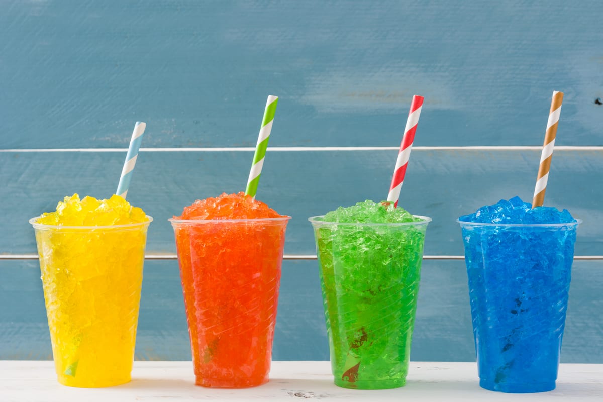 Slush Machine hire — refreshing colorful slushies with striped straws | Panda Party Hire Hire slush machine — refreshing colorful slushies with striped straws for parties and events in Johannesburg, Sandton and Randburg