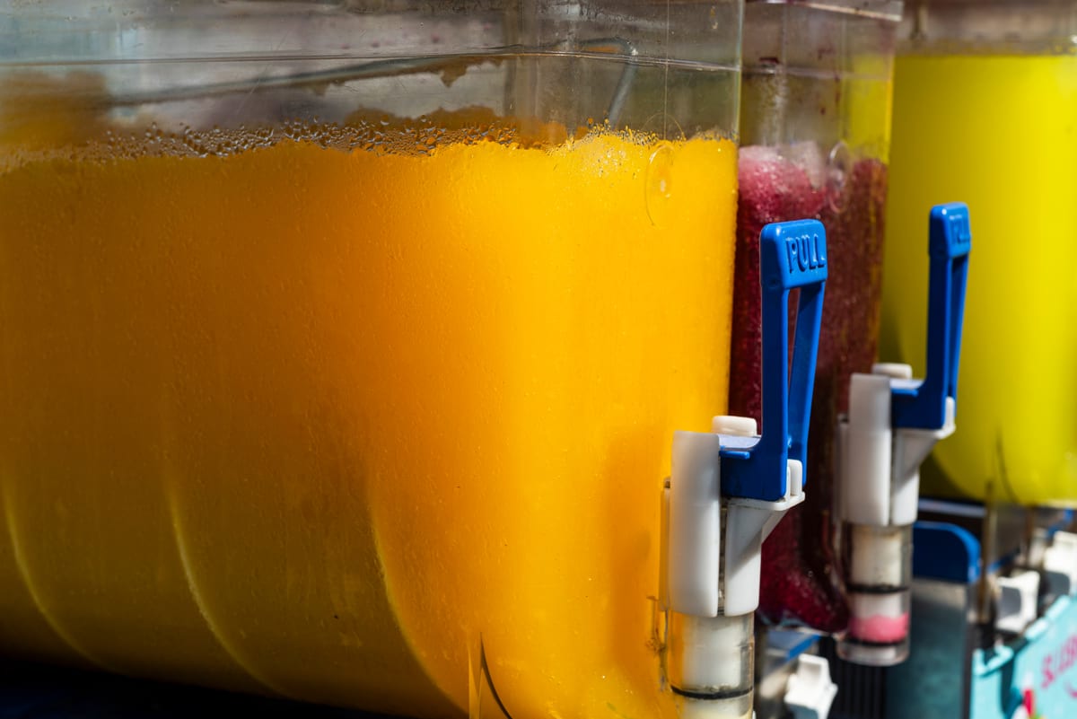 Slush Machine hire — multicolored ice juice in the machine turkey jul | Panda Party Hire Hire slush machine — multicolored ice juice in the machine turkey jul for parties and events in Johannesburg, Sandton and Randburg