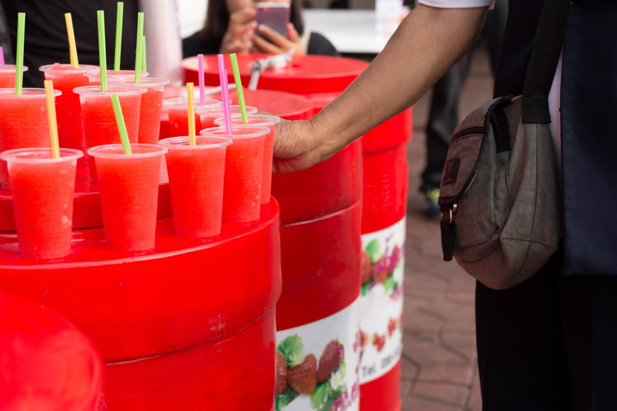 Slush Machine hire — refreshing red drinks for sale at street market | Panda Party Hire Hire slush machine — refreshing red drinks for sale at street market for parties and events in Johannesburg, Sandton and Randburg
