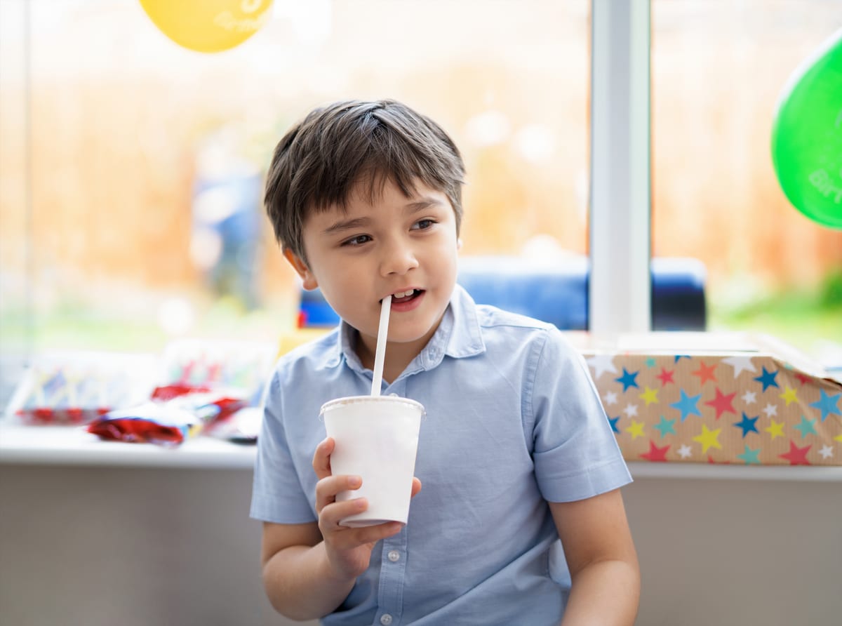 Slush Machine hire — boy with drink at birthday party | Panda Party Hire Hire slush machine — boy with drink at birthday party for parties and events in Johannesburg, Sandton and Randburg