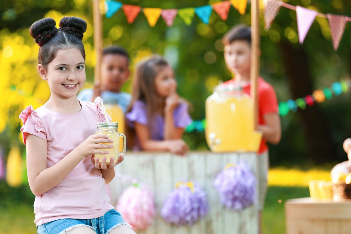 Slush Machine hire — cute little girl with natural lemonade in park sp | Panda Party Hire Hire slush machine — cute little girl with natural lemonade in park sp for parties and events in Johannesburg, Sandton and Randburg