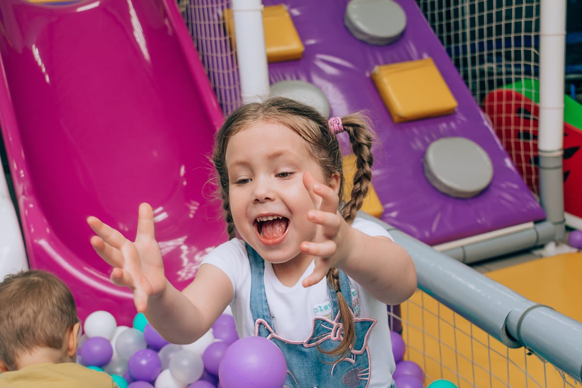 Hire soft play equipment — happy girl having fun in indoor playground for parties and events in Johannesburg, Sandton and Randburg
