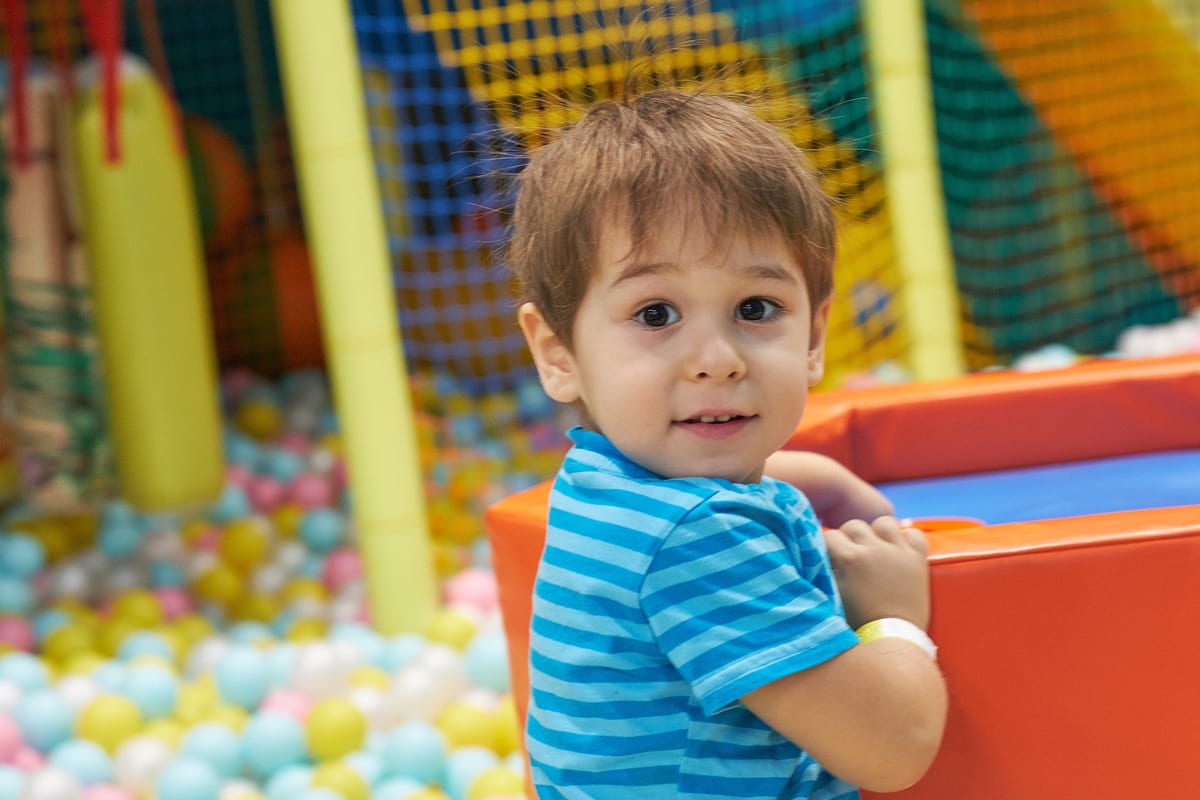 Hire soft play equipment — child of three years old is playing in a ball pool for parties and events in Johannesburg, Sandton and Randburg