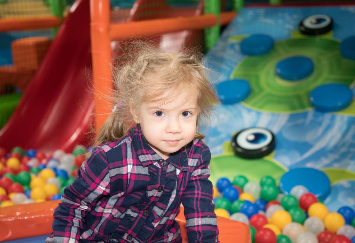 Hire soft play equipment — child with blonde hair in a colorful playroom for parties and events in Johannesburg, Sandton and Randburg
