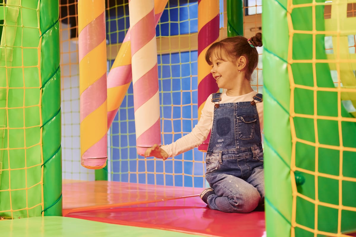Hire soft play equipment — happy little girl in casual clothes have fun in ch for parties and events in Johannesburg, Sandton and Randburg