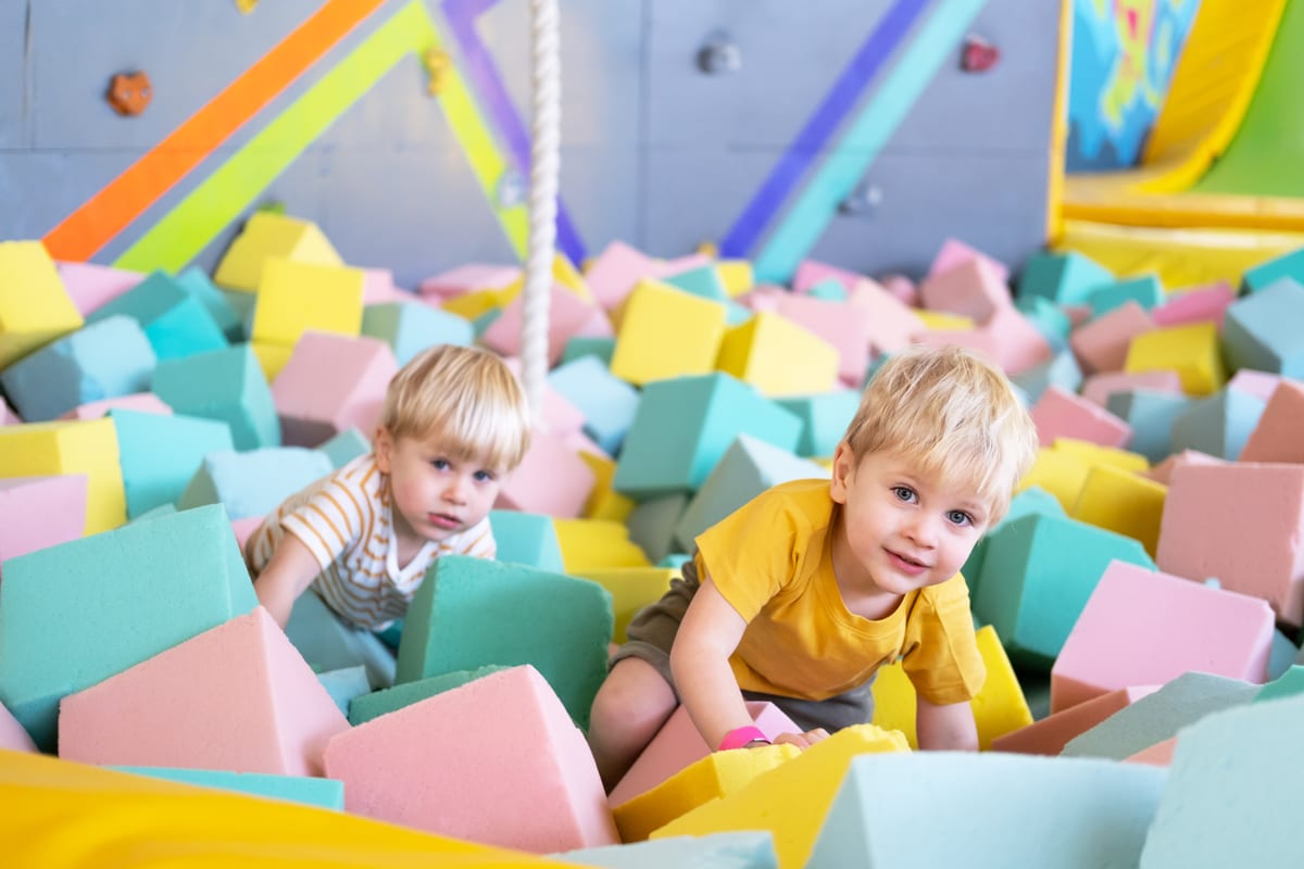 Hire soft play equipment — two cute little boys twins plays with soft cubes for parties and events in Johannesburg, Sandton and Randburg