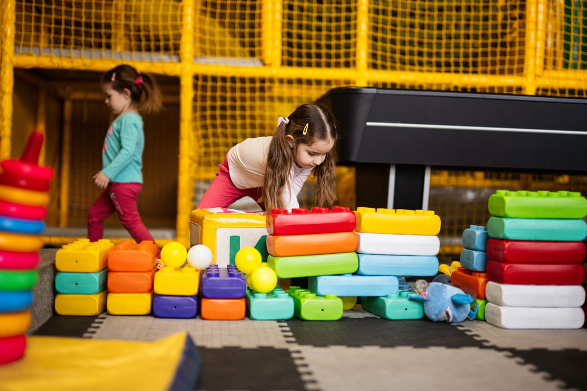 Hire soft play equipment — two sisters playing at kids play center while buil for parties and events in Johannesburg, Sandton and Randburg