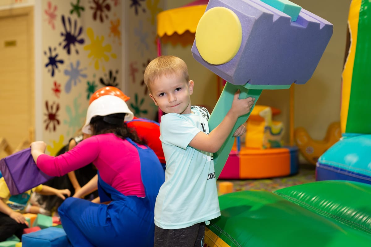Hire soft play equipment — a boy is playing on the playground with cubes and for parties and events in Johannesburg, Sandton and Randburg
