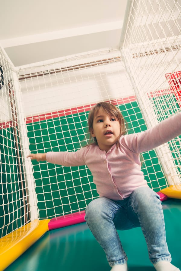 Hire soft play equipment — girl playing in an indoor playground activity cent for parties and events in Johannesburg, Sandton and Randburg