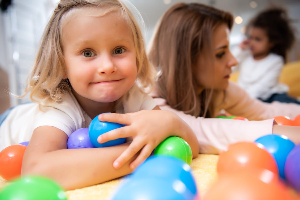 Hire soft play equipment — child plays with colorful balls with adult present for parties and events in Johannesburg, Sandton and Randburg