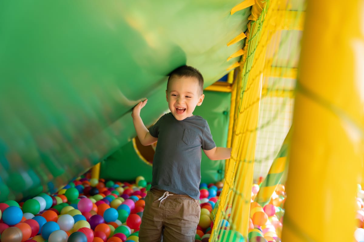 Hire soft play equipment — happy child playing in colorful ball pit for parties and events in Johannesburg, Sandton and Randburg
