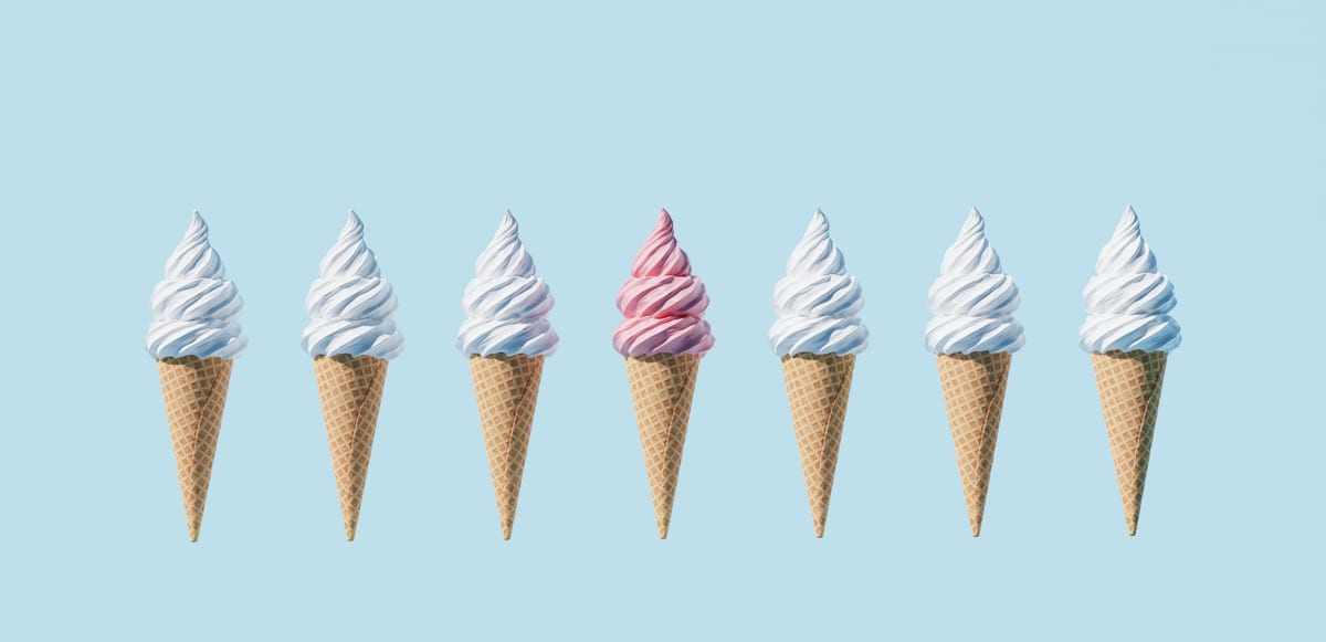 Hire soft serve machine — ice cream cones in a row on blue for parties and events in Johannesburg, Sandton and Randburg