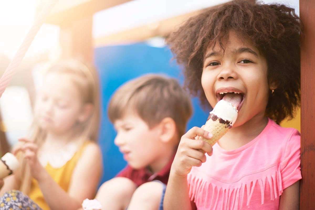 Hire soft serve machine — children eating ice cream cones at playground for parties and events in Johannesburg, Sandton and Randburg