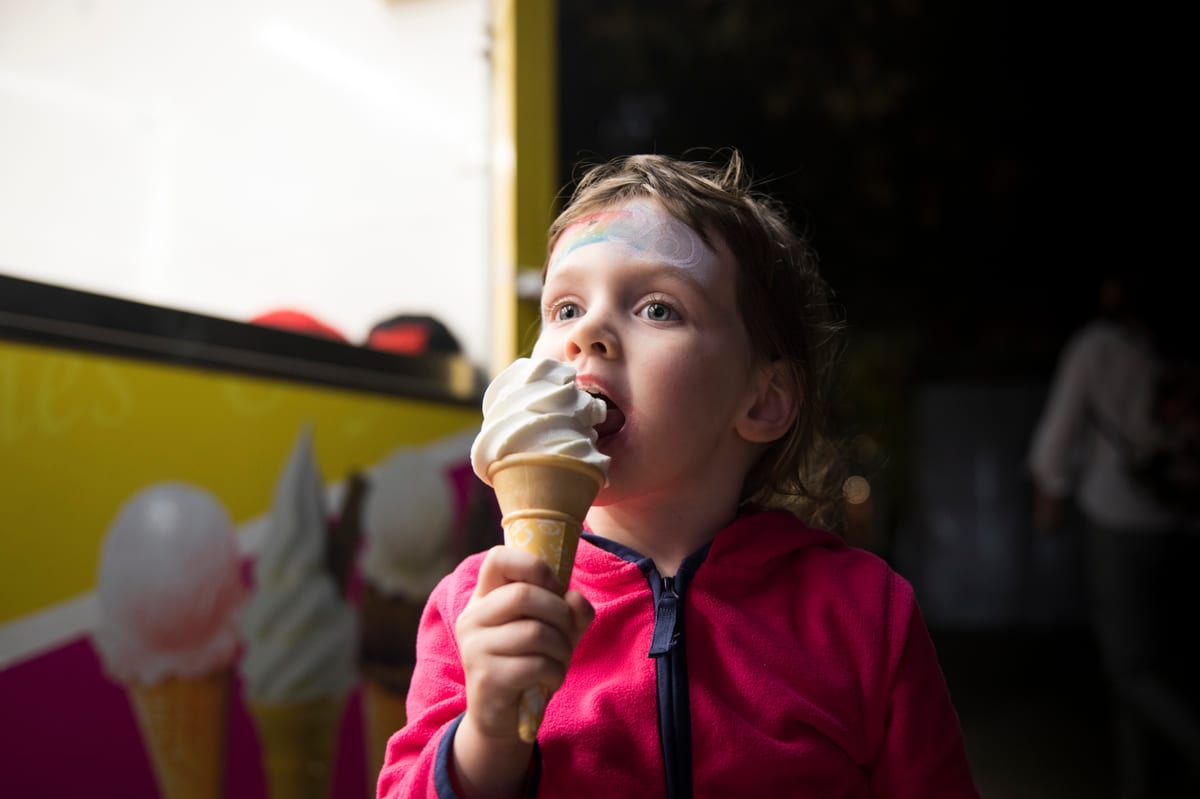 Hire soft serve machine — child enjoying ice cream by a food truck for parties and events in Johannesburg, Sandton and Randburg