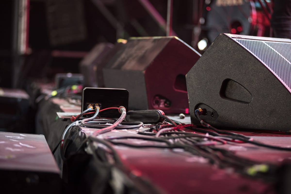Hire sound system — concert speaker system with audio cables on stage for parties and events in Johannesburg, Sandton and Randburg