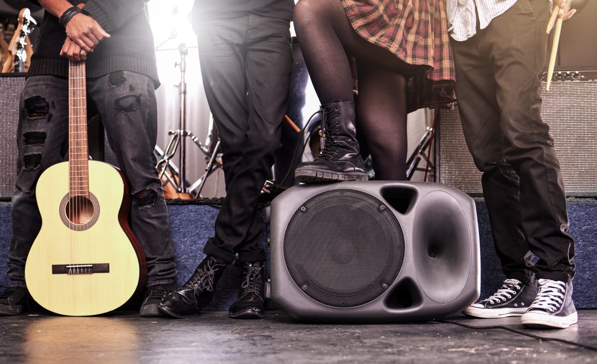 Hire sound system — band posing with instruments and speaker for parties and events in Johannesburg, Sandton and Randburg