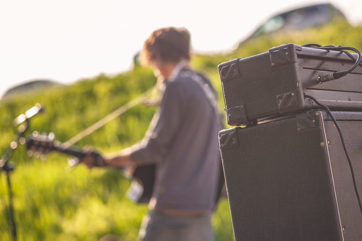Hire sound system — detail of a rock band s amplifiers with musicians for parties and events in Johannesburg, Sandton and Randburg