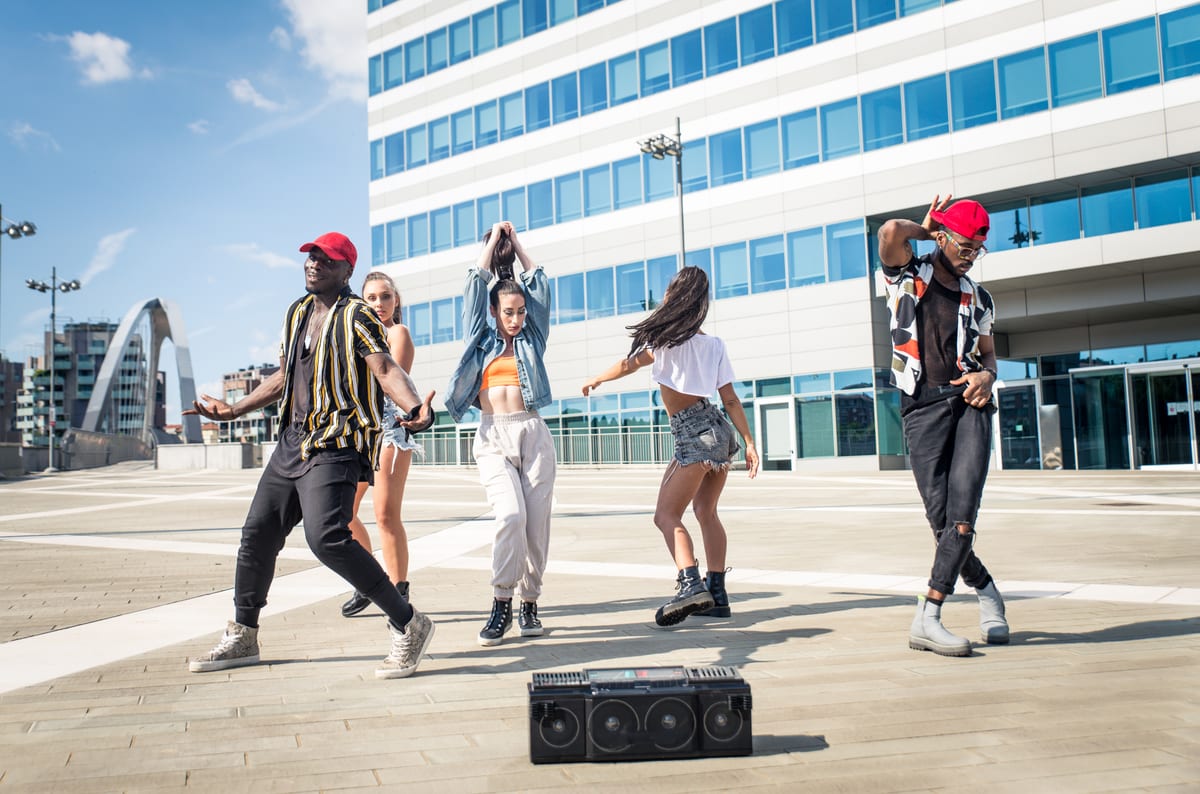 Hire sound system — group of young adults dancing on urban plaza for parties and events in Johannesburg, Sandton and Randburg