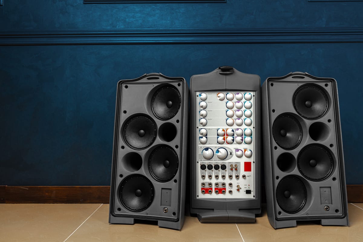 Hire sound system — modern audio system against a blue wall for parties and events in Johannesburg, Sandton and Randburg