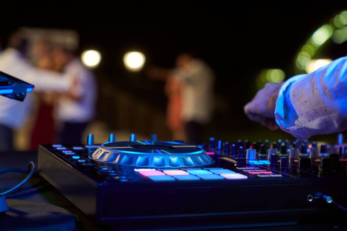 Hire sound system — dj equipment at nighttime event with dancing peopl for parties and events in Johannesburg, Sandton and Randburg