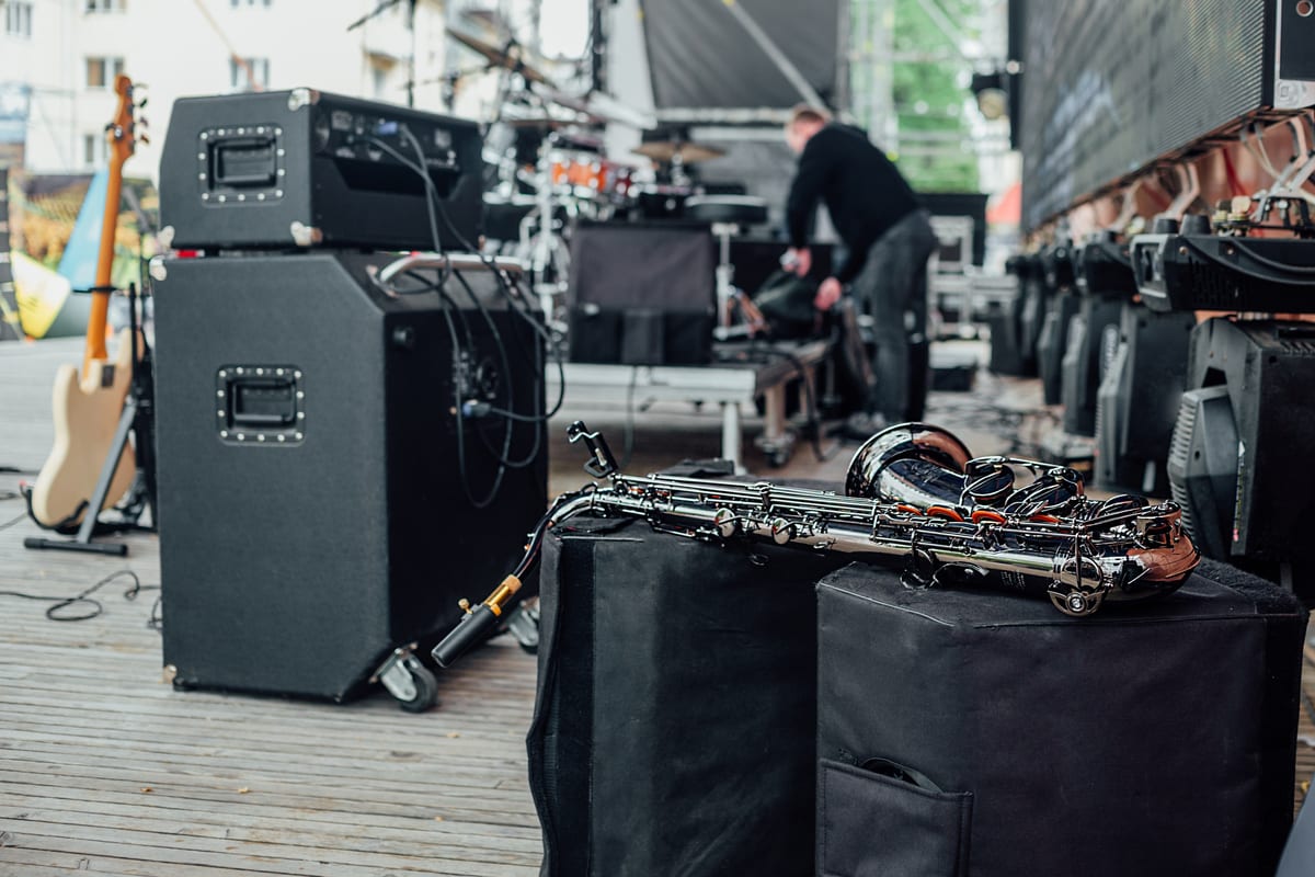 Hire sound system — shiny saxophone instrument on stage with musical e for parties and events in Johannesburg, Sandton and Randburg