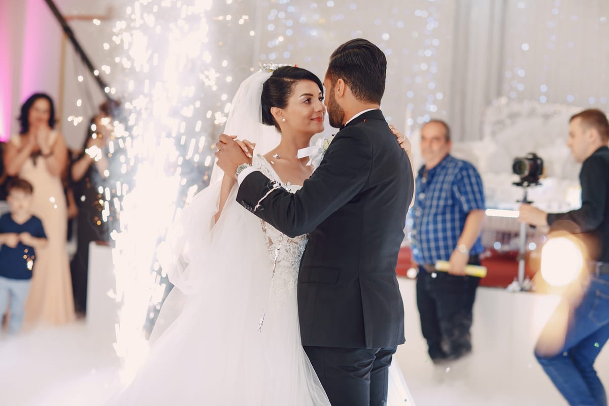 Hire sound system — bride and groom embrace with fireworks at wedding for parties and events in Johannesburg, Sandton and Randburg