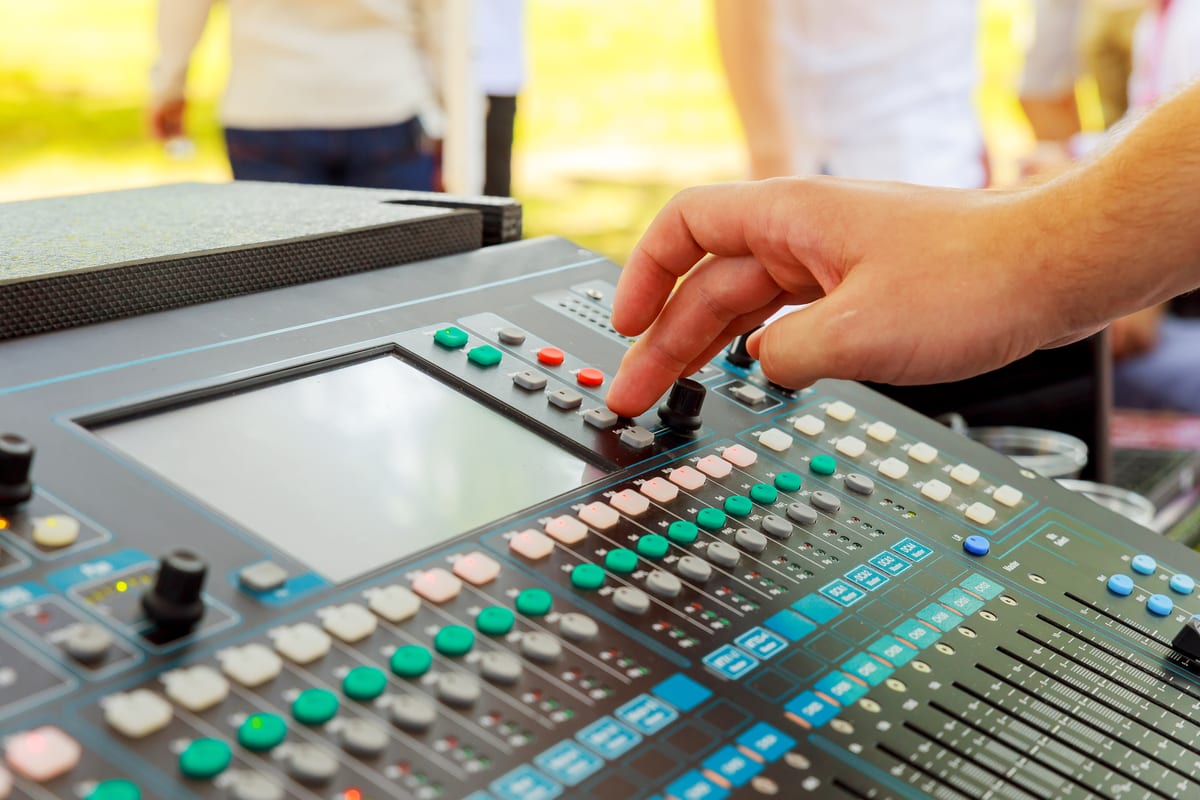 Hire sound system — sound mixer in action hand music console for parties and events in Johannesburg, Sandton and Randburg