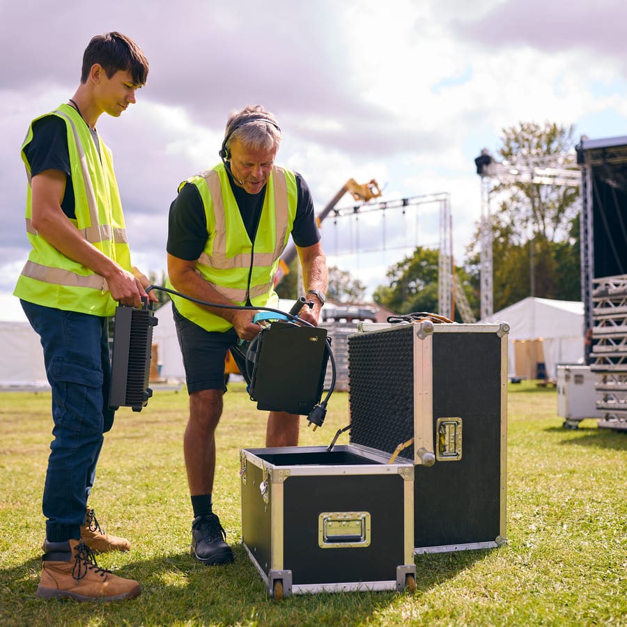 Hire sound system — technicians prepare sound equipment for outdoor pe for parties and events in Johannesburg, Sandton and Randburg